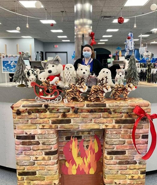 Winter plush animals and holiday decor at the Fly Buy Gift Shop